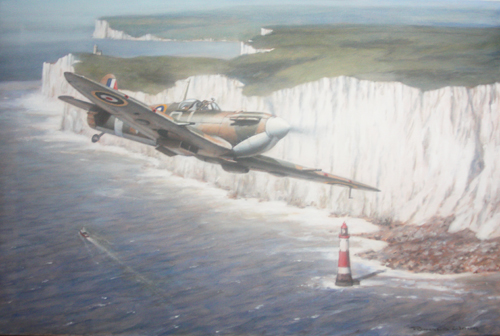 Homeward bound, a Spitfire 1b of 92 Squadron overflies Beachy Head off the White Cliffs.